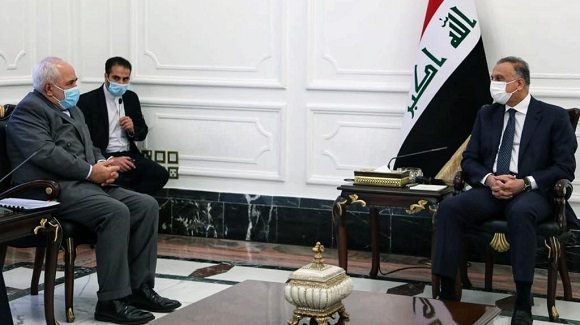Iraqi PM, Iranian FM stress on developing bilateral ties