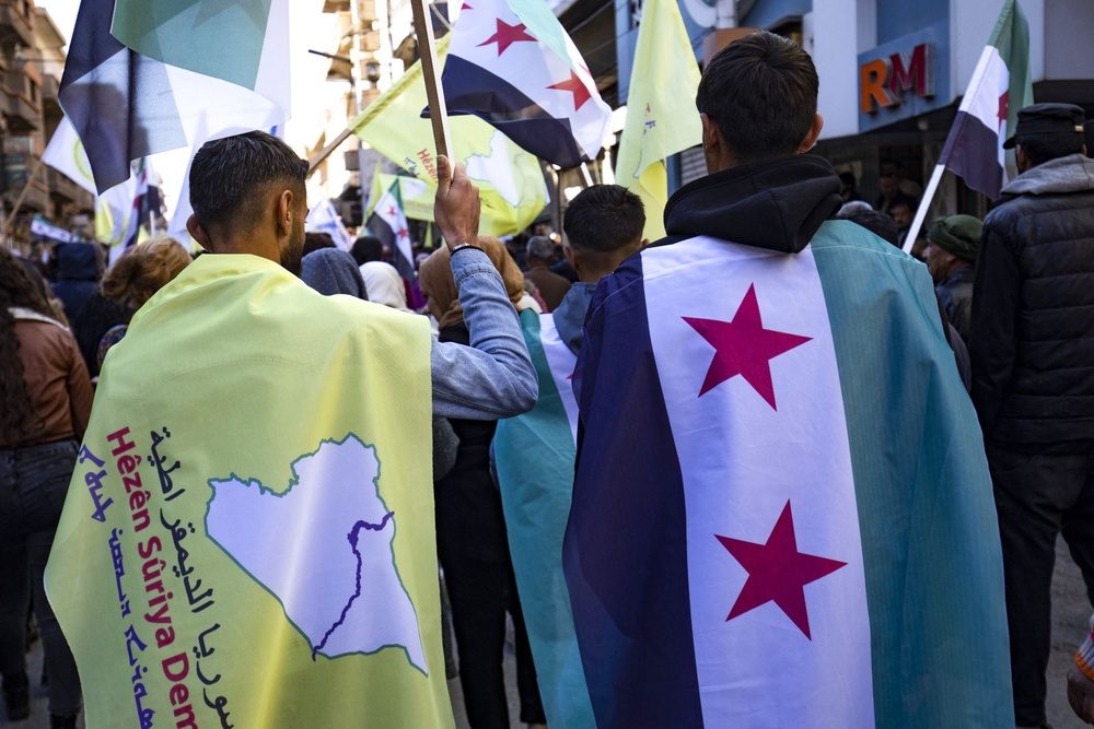 different accounts of the integration of the Kurdish structure into the Damascus government