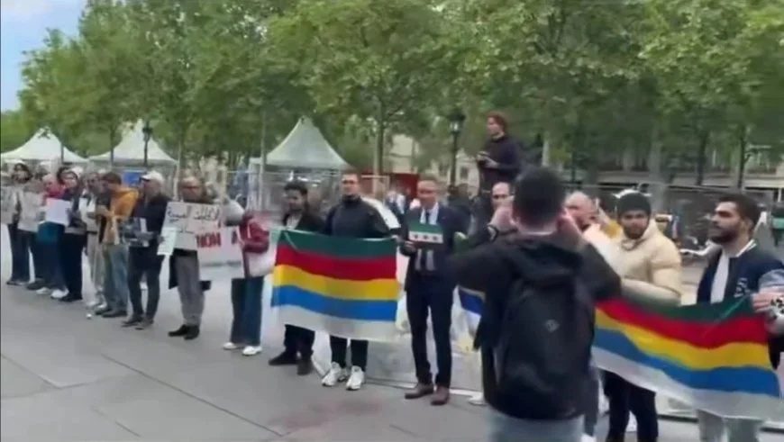 دیدار جولانی با مکرون در کاخ الیزه با اعتراض پناهجویان سوری همراه شد