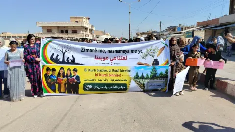Thousands march in Kobani to protest restrictions on Kurdish language education